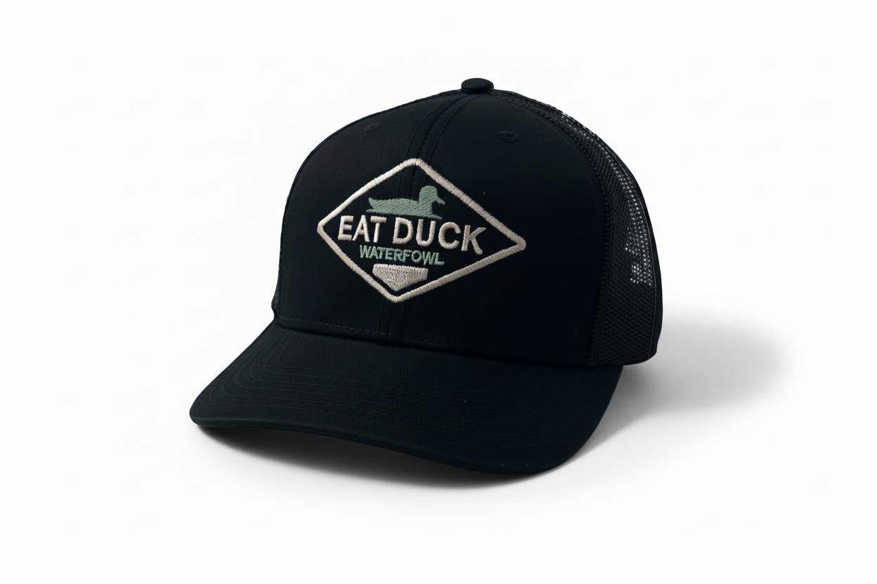 Black cap with 'EAT DUCK' logo on a white background